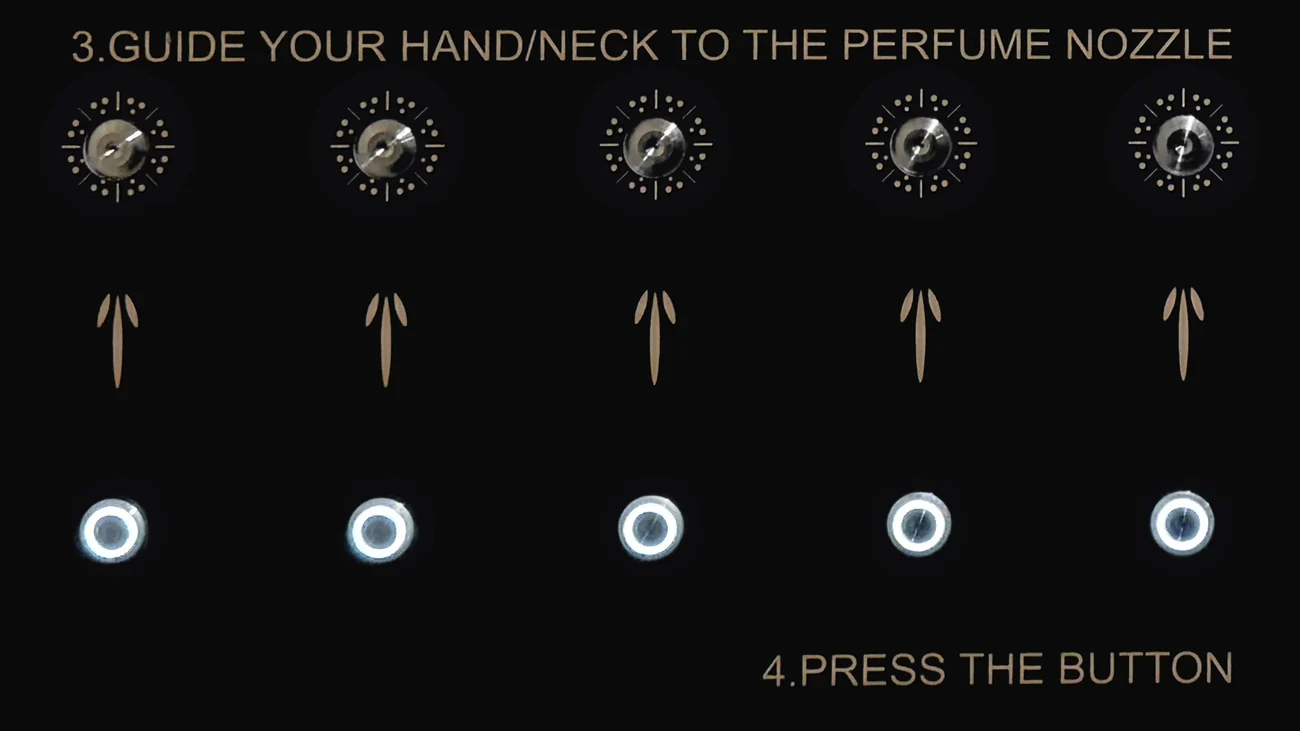 The five nozzles and lit buttons on the unit's black glass front